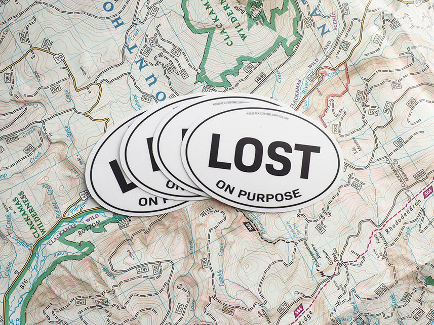 Lost on Purpose White Oval Bumper Sticker - 3" & 4"
